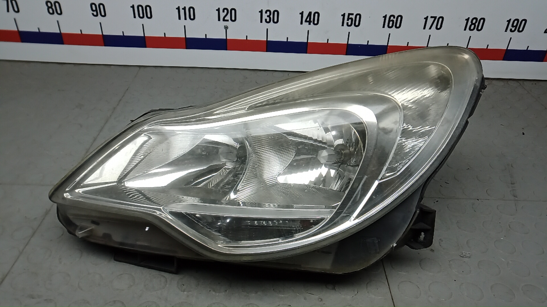 Фара левая Opel Corsa D