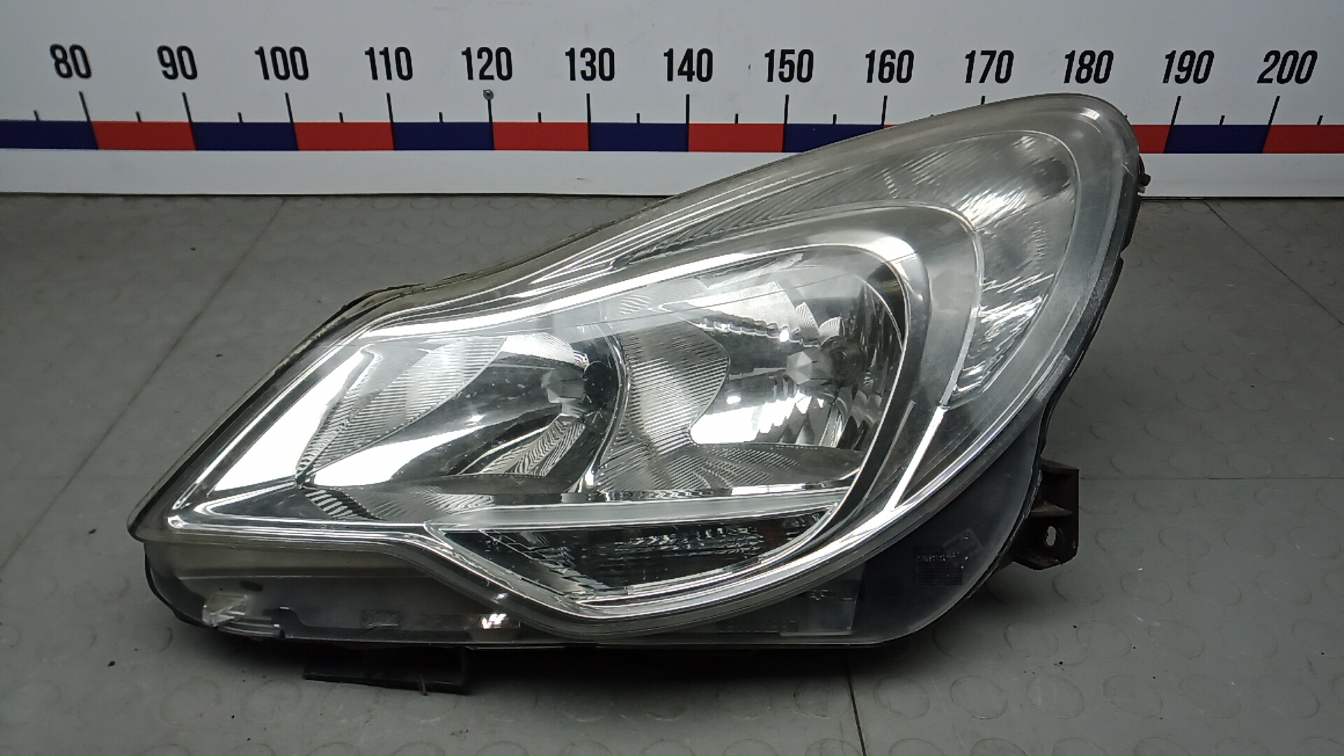 Фара левая Opel Corsa D