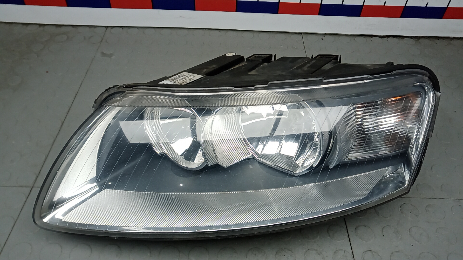 Фара левая Audi A6 Allroad C6