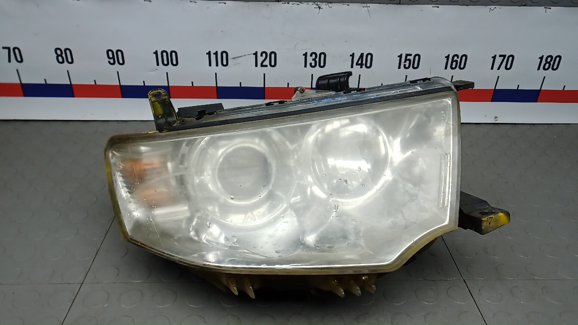 Фара правая Mitsubishi L200 K4T