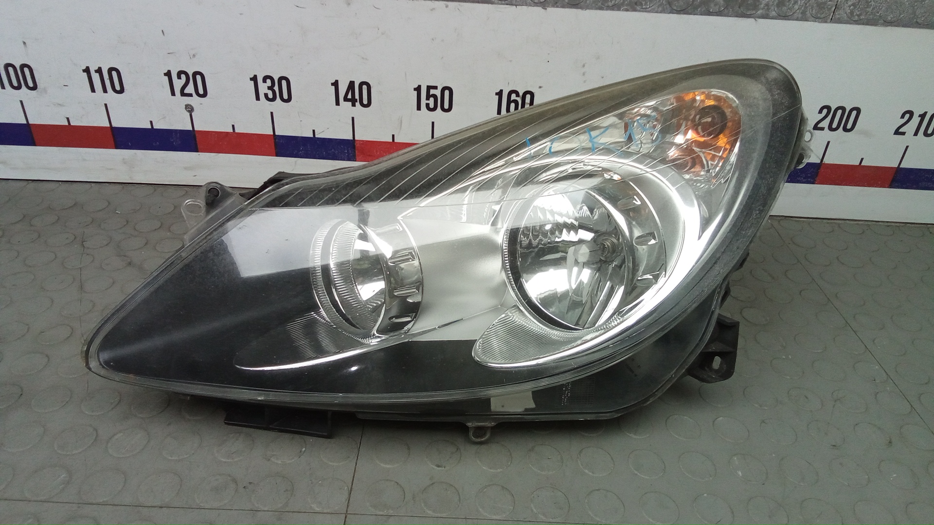 Фара левая Opel Corsa D
