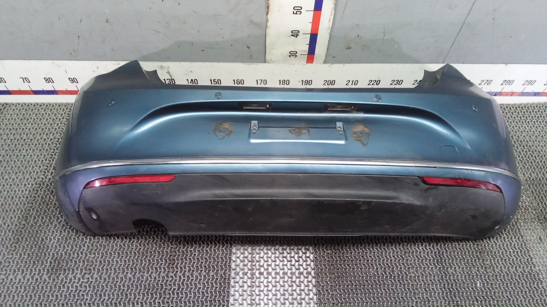 Бампер задний Opel Astra J