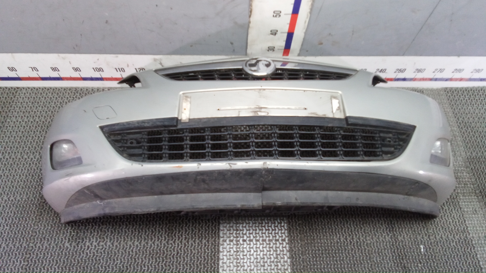 Бампер передний Opel Astra J