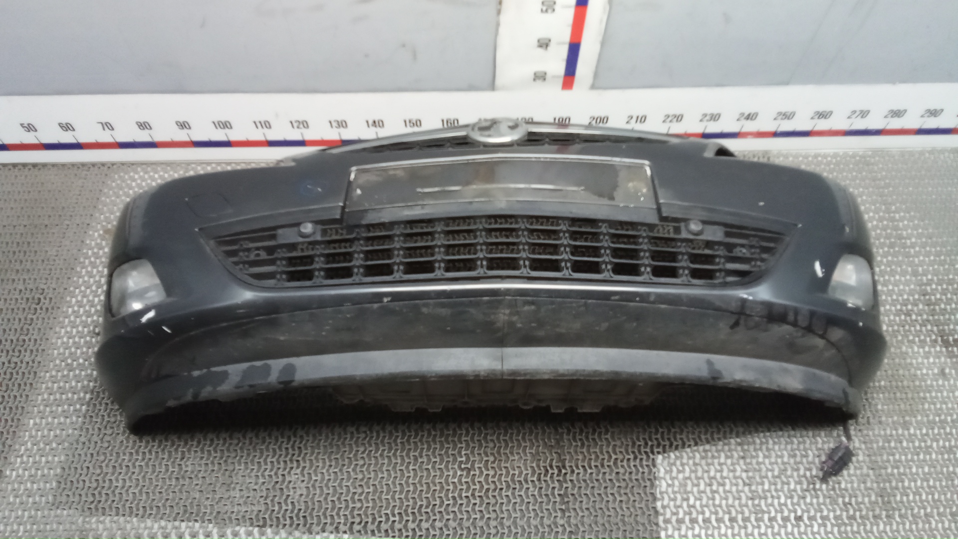 Бампер передний Opel Astra J