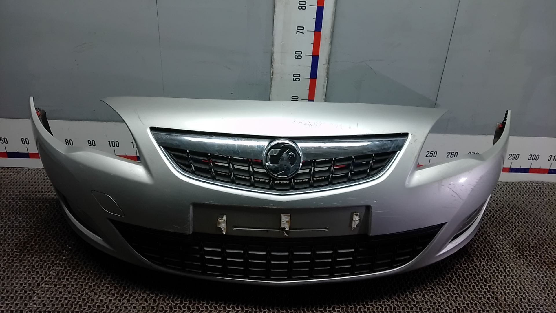 Бампер передний Opel Astra J