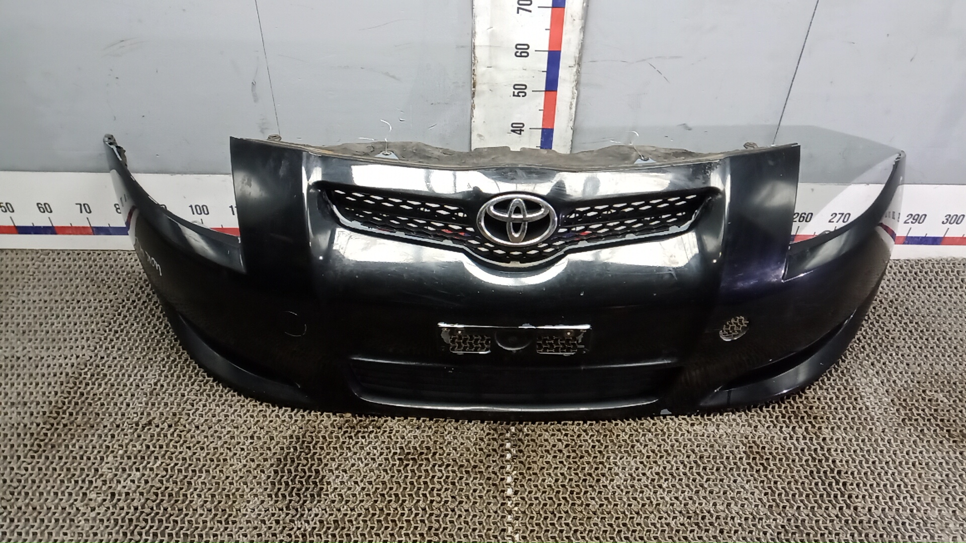 Бампер передний Toyota Auris E150