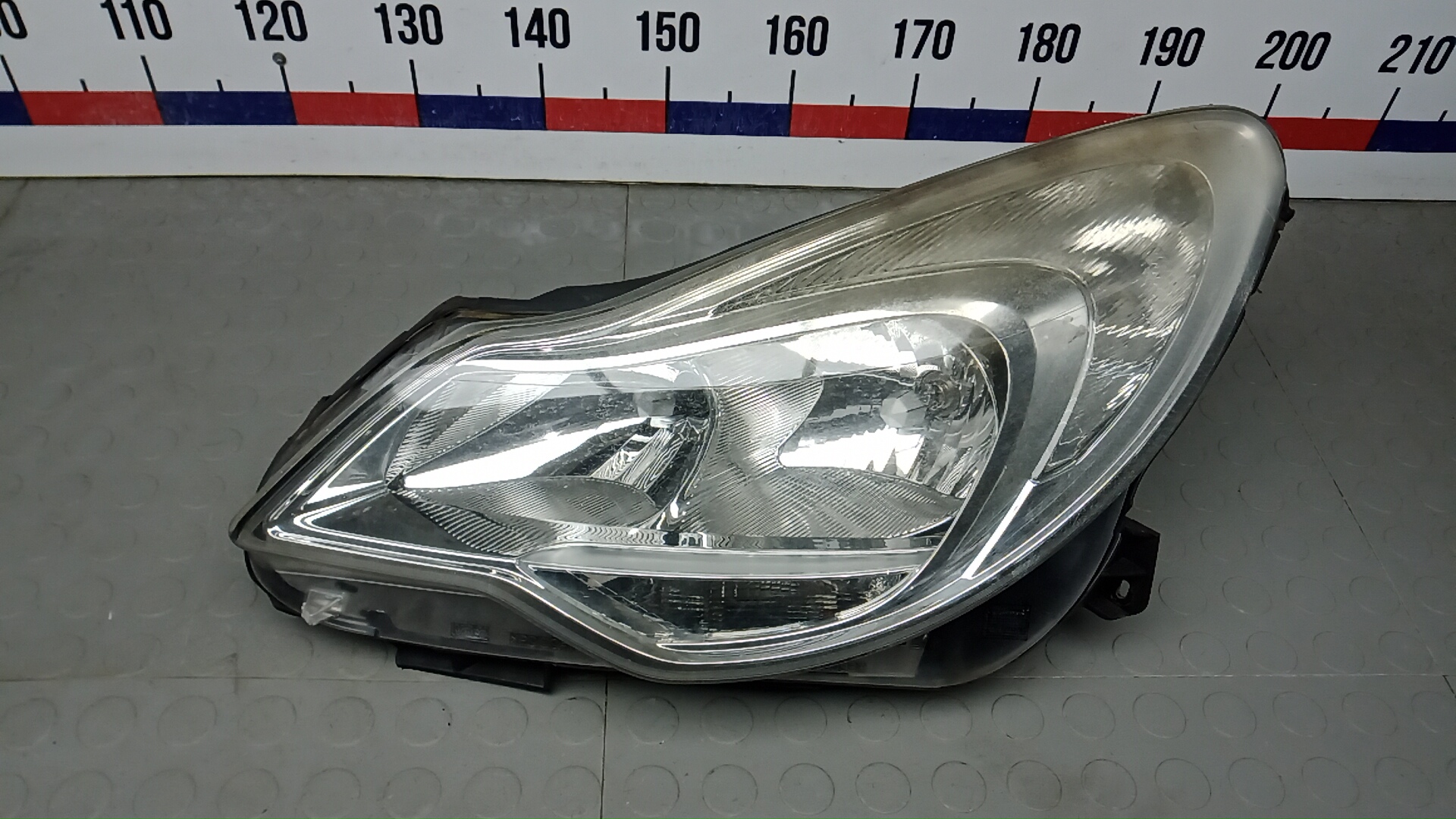 Фара левая Opel Corsa D