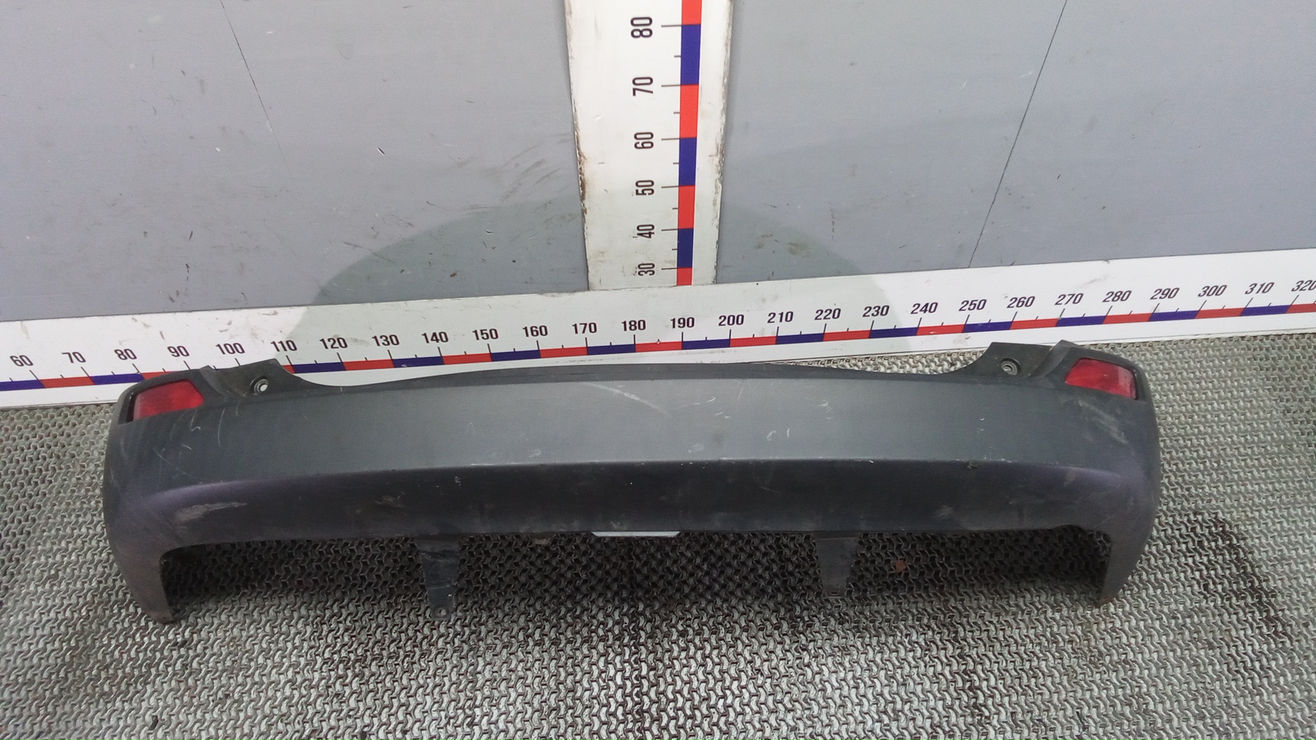 Бампер задний Toyota RAV4 CA40