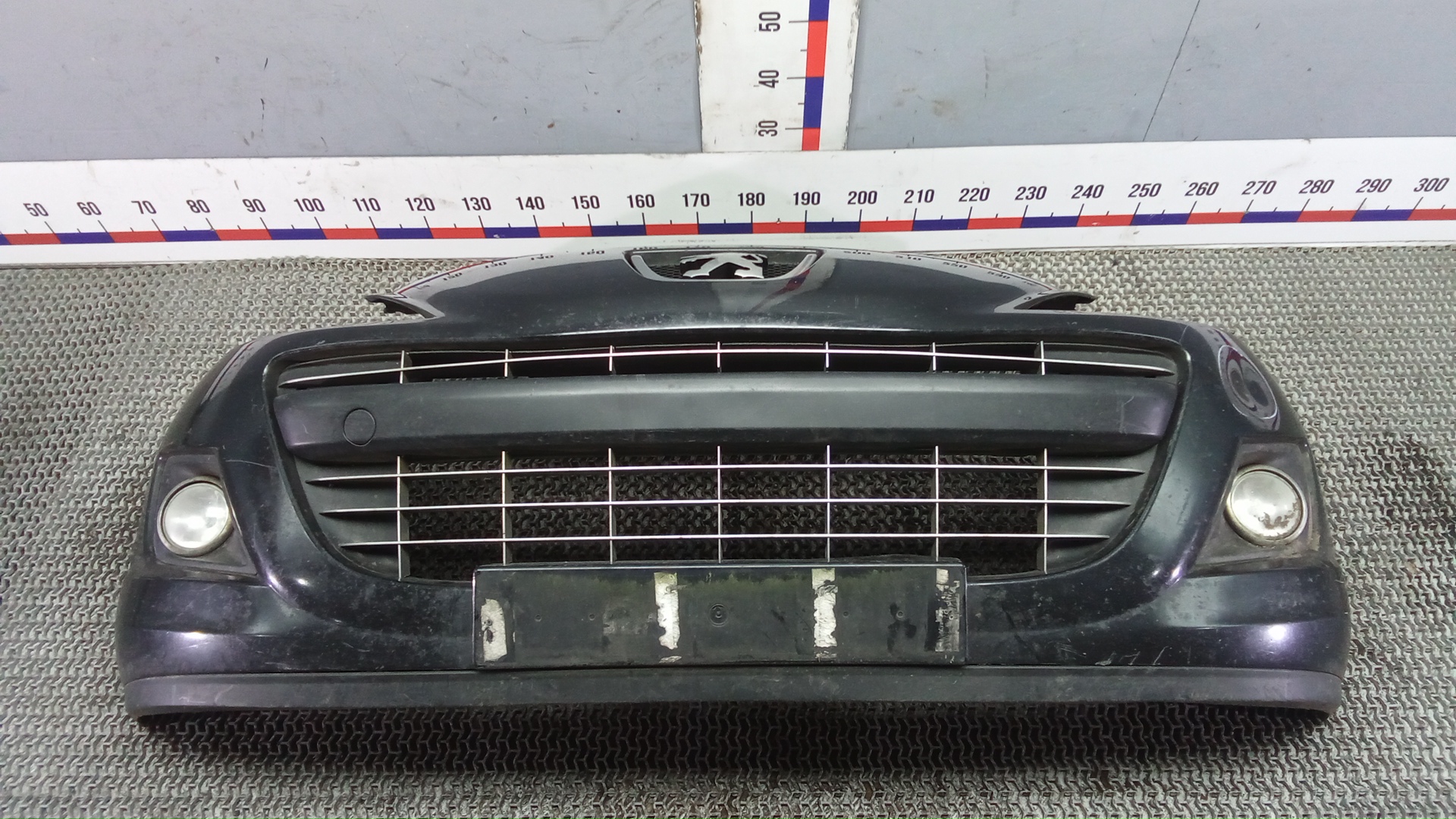 Бампер передний Peugeot 207
