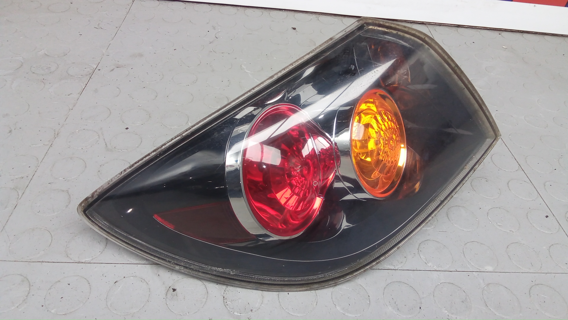 Фонарь задний левый Mazda 3 1