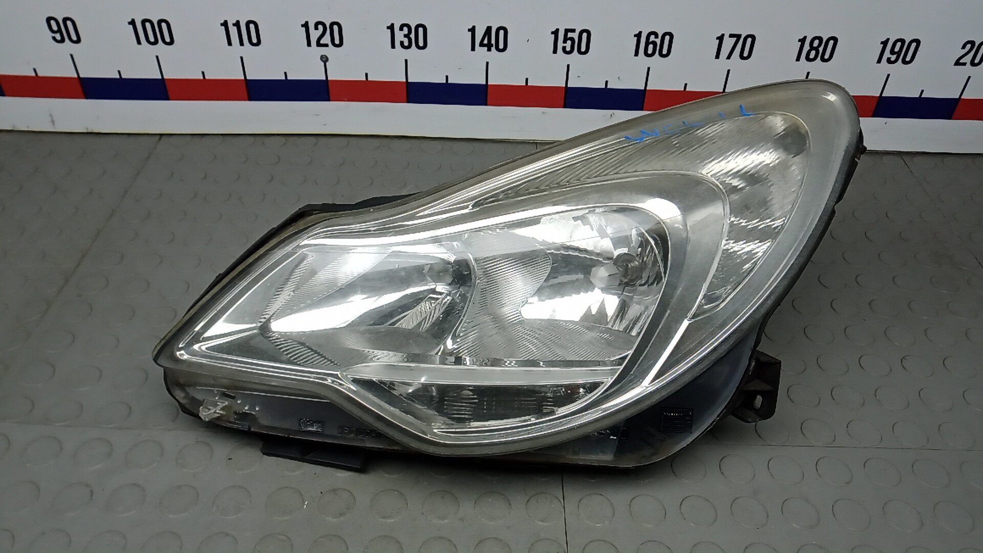 Фара левая Opel Corsa D