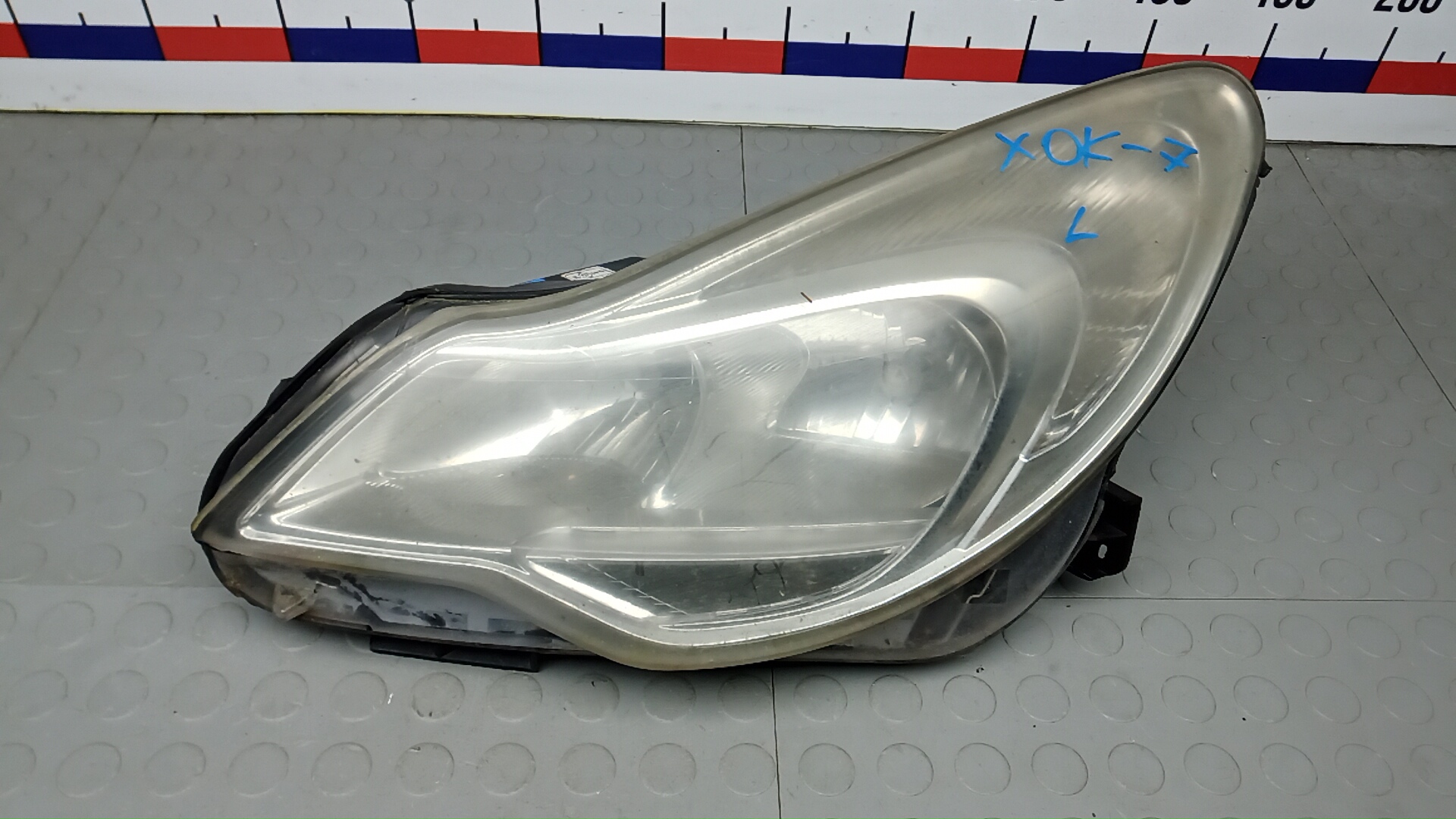 Фара левая Opel Corsa D