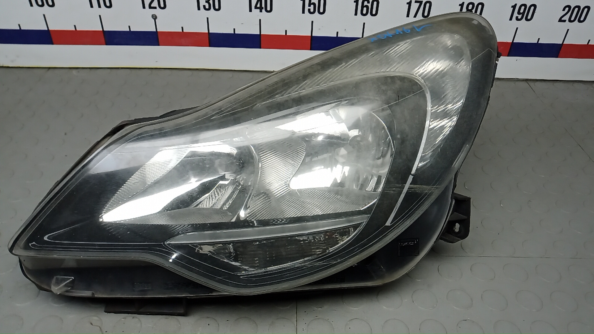 Фара левая Opel Corsa D