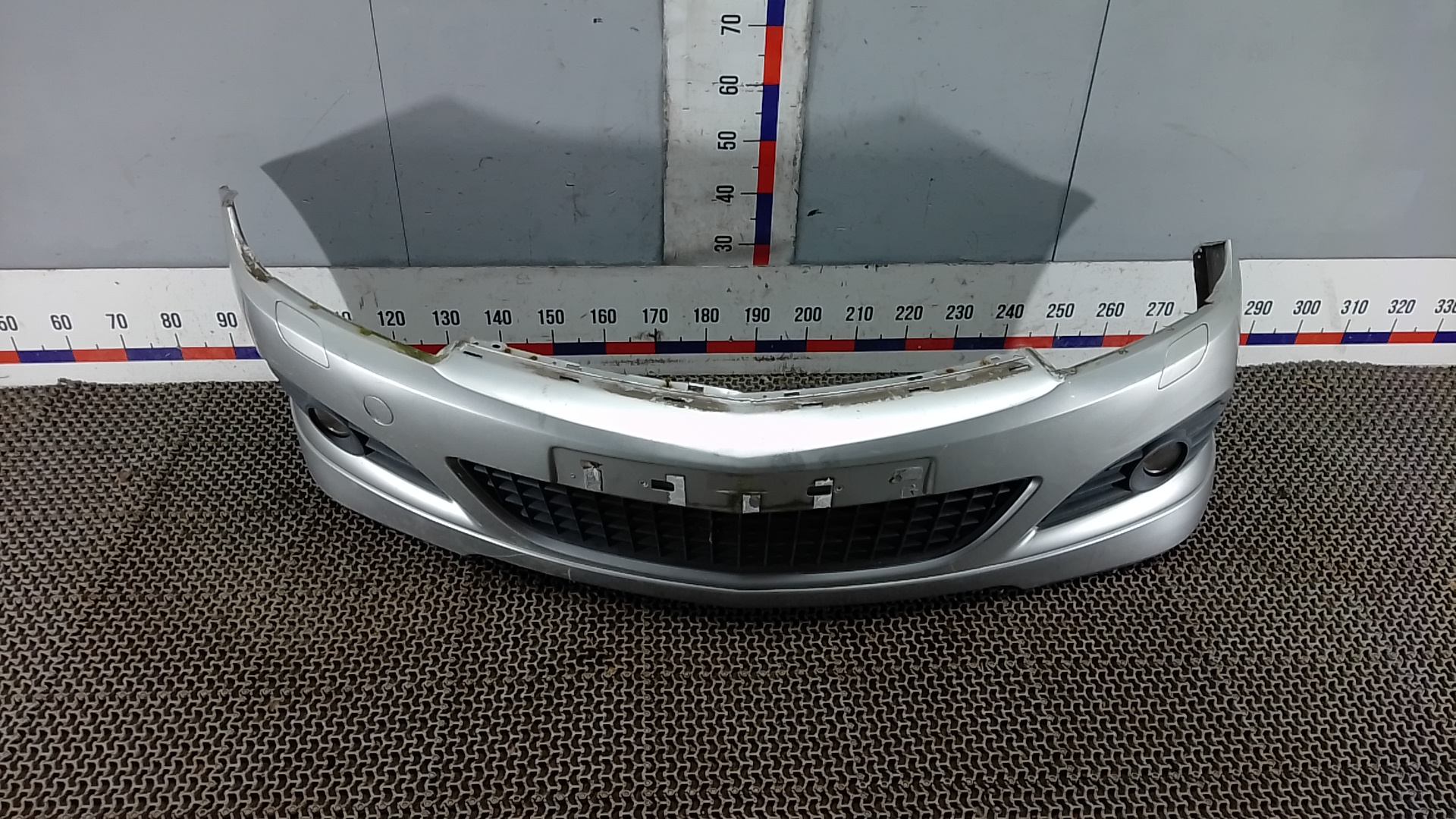 Бампер передний Opel Astra H