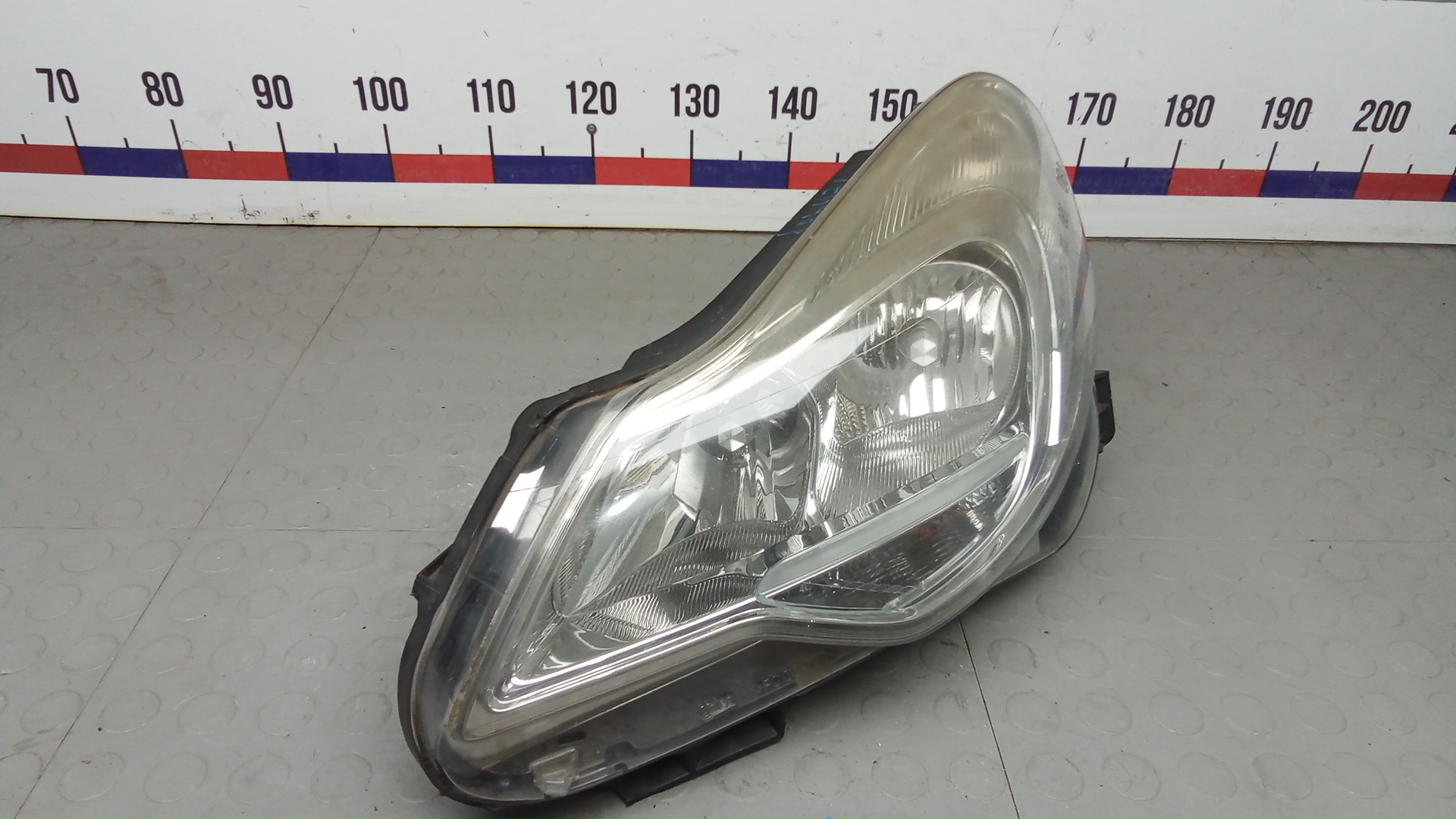 Фара левая Opel Corsa D
