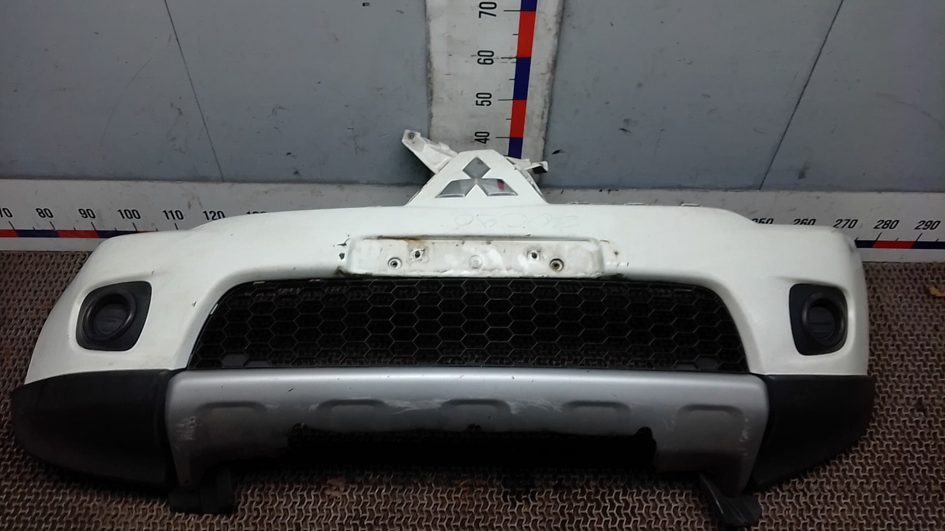 Бампер передний Mitsubishi L200 K4T