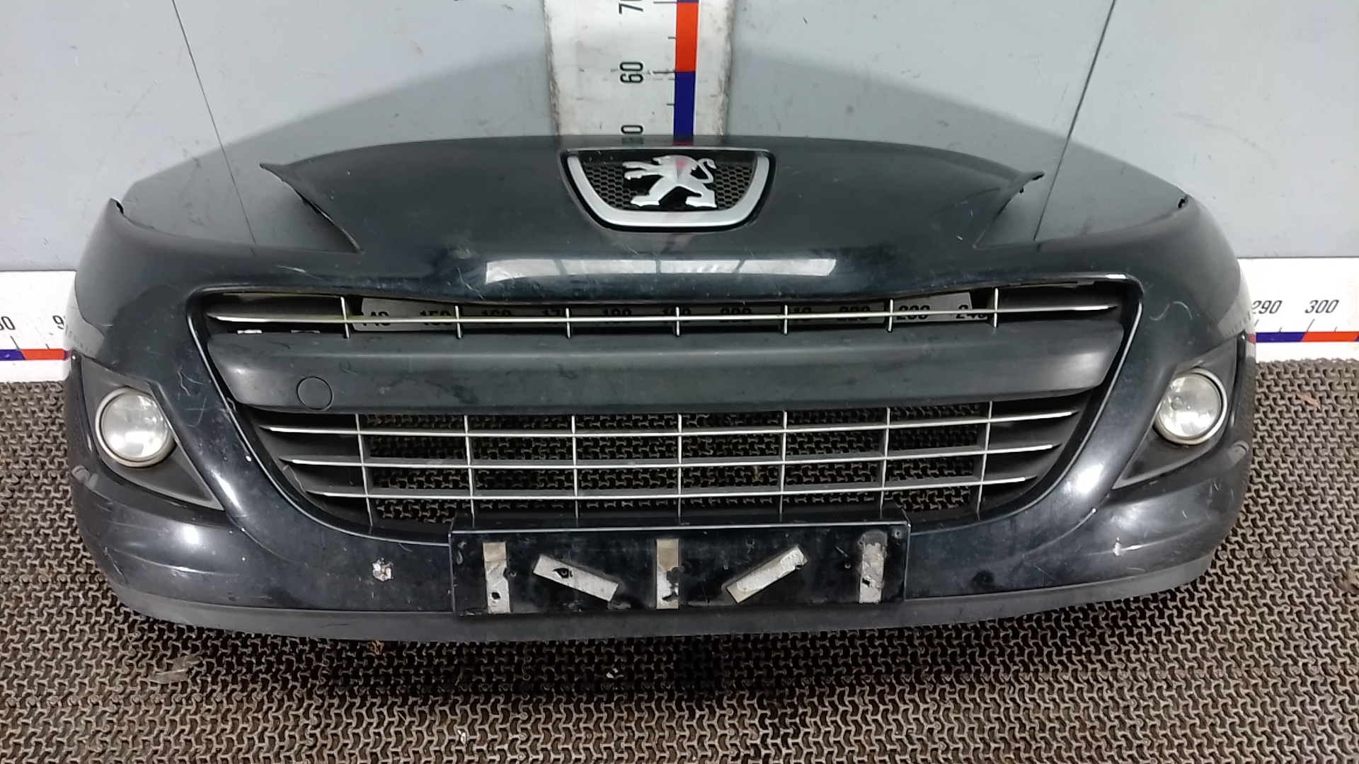 Бампер передний Peugeot 207