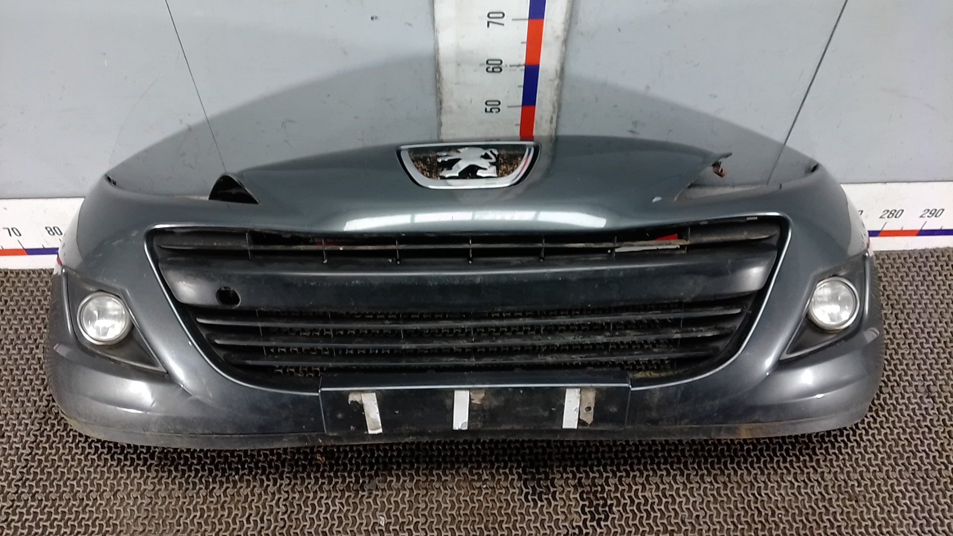 Бампер передний Peugeot 207