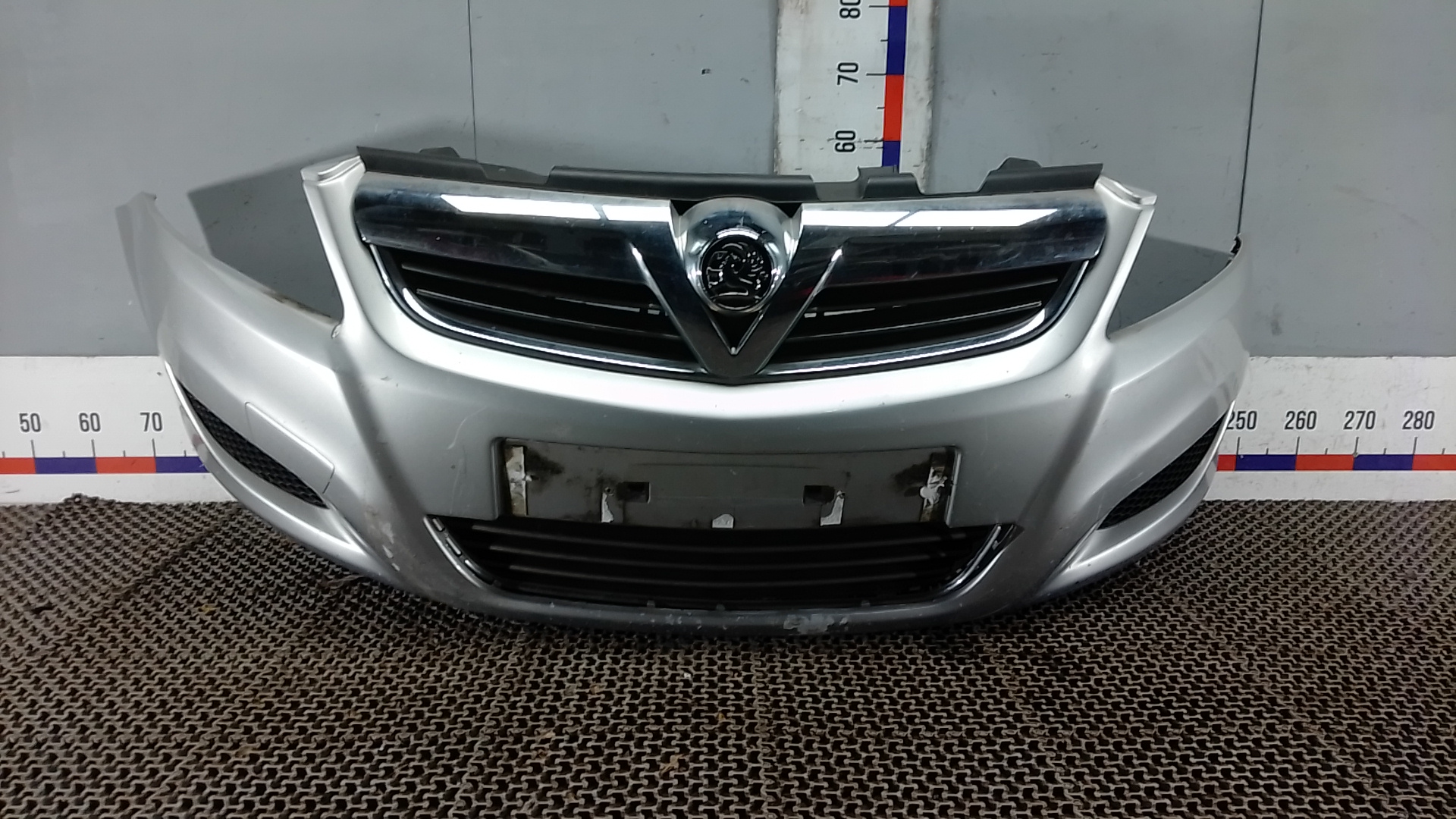 Бампер передний Opel Zafira B