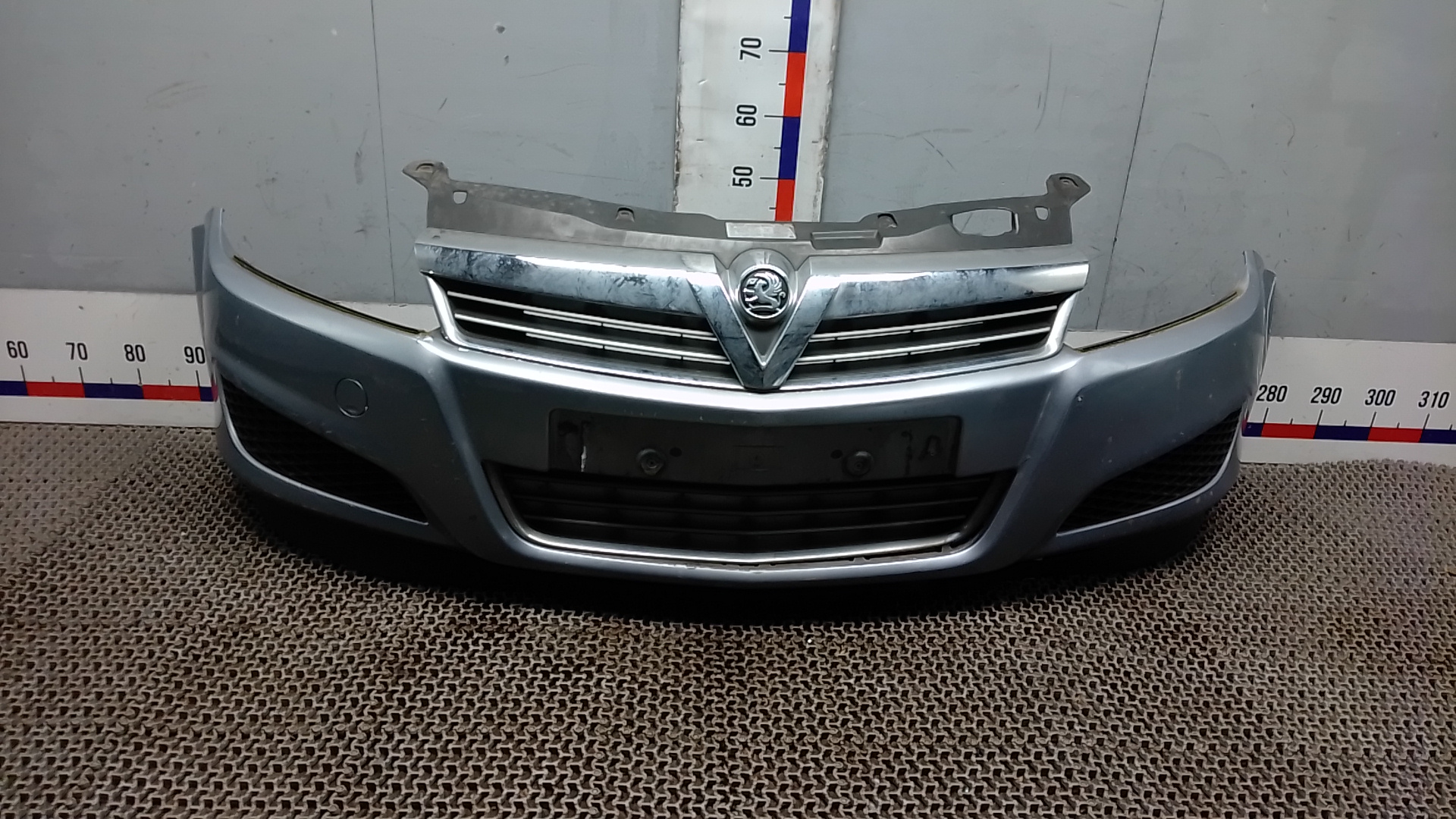 Бампер передний Opel Astra H