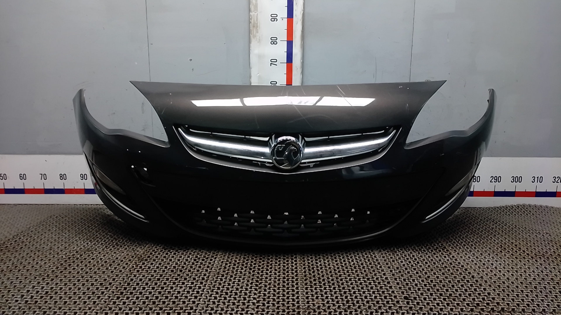 Бампер передний Opel Astra J
