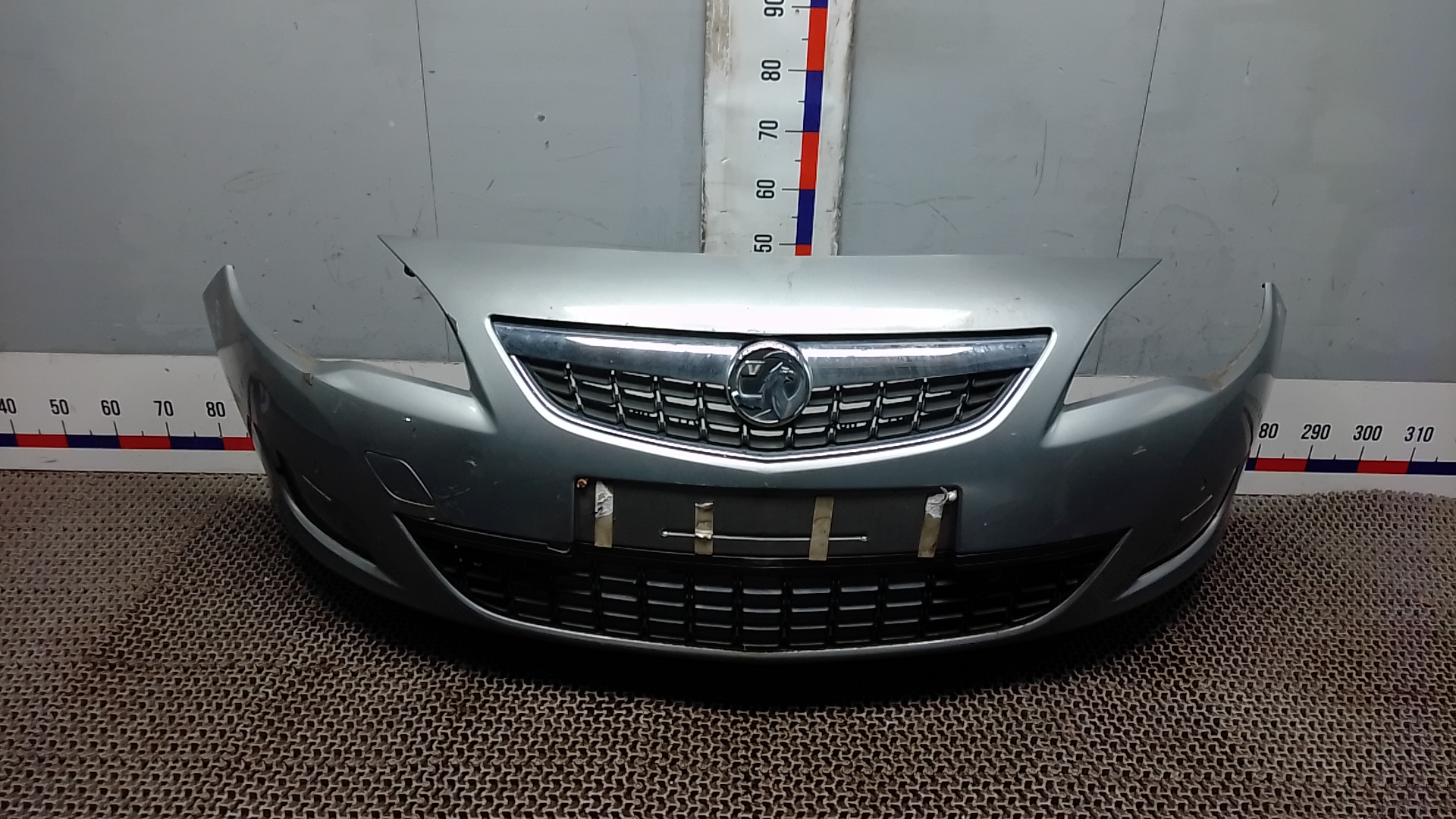 Бампер передний Opel Astra J