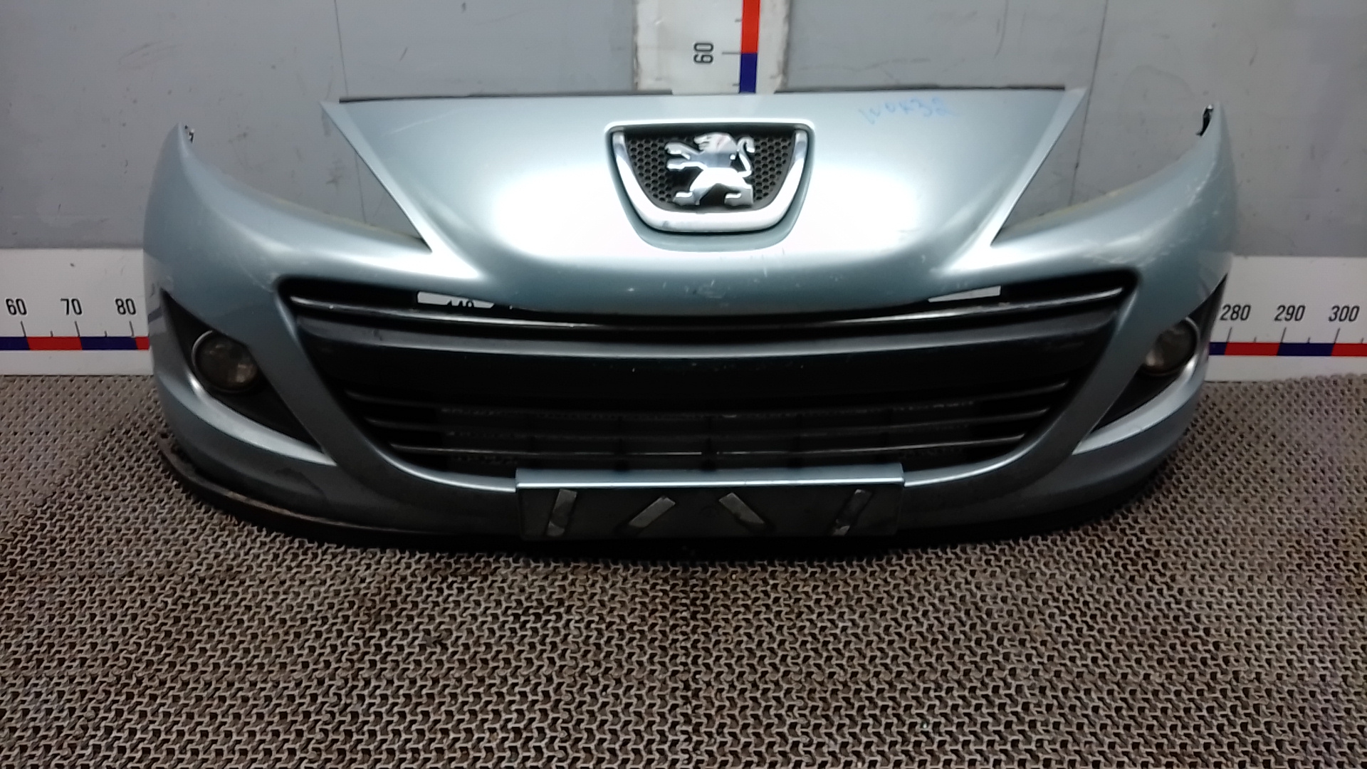 Бампер передний Peugeot 207