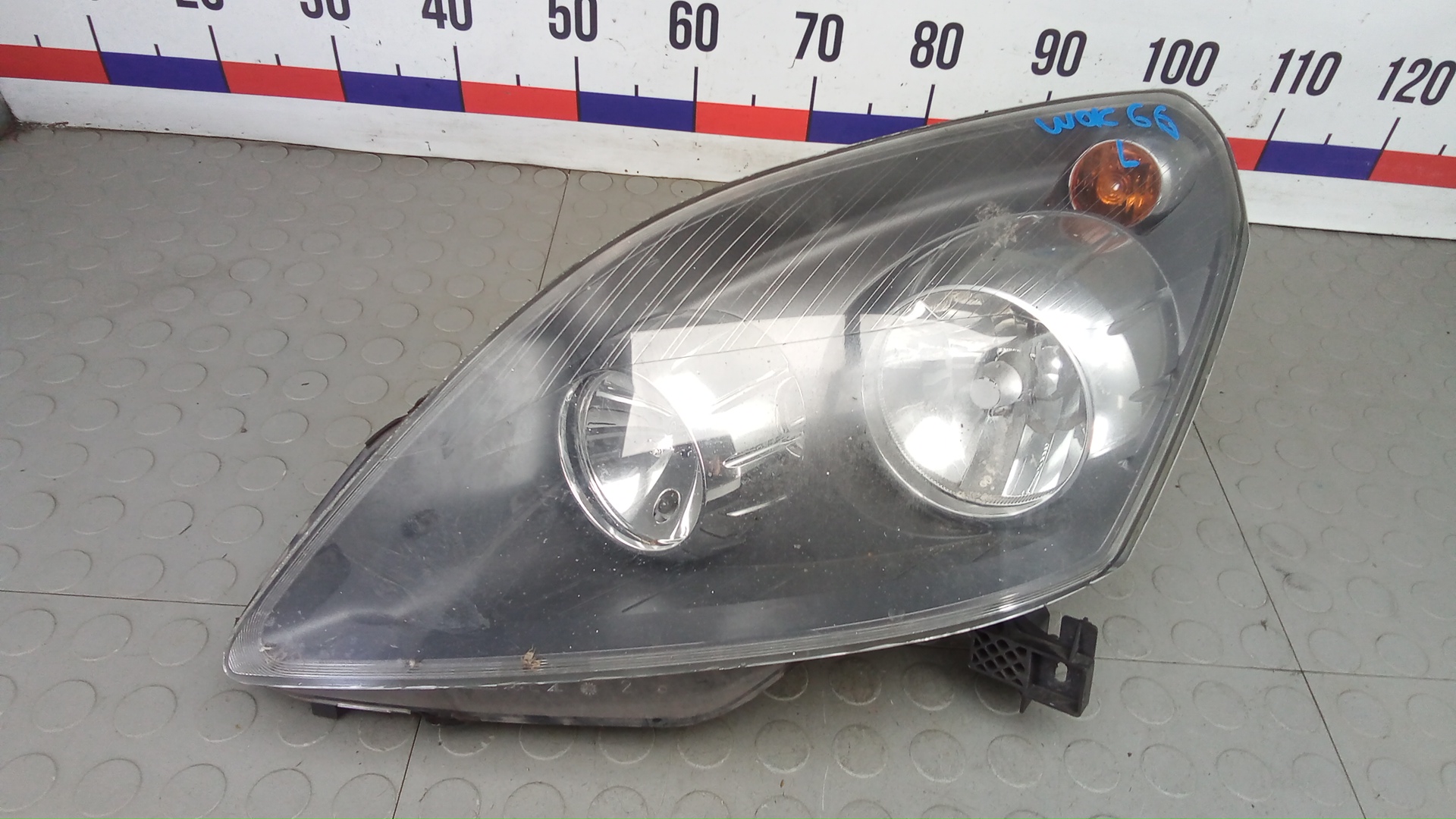 Фара левая Opel Zafira B