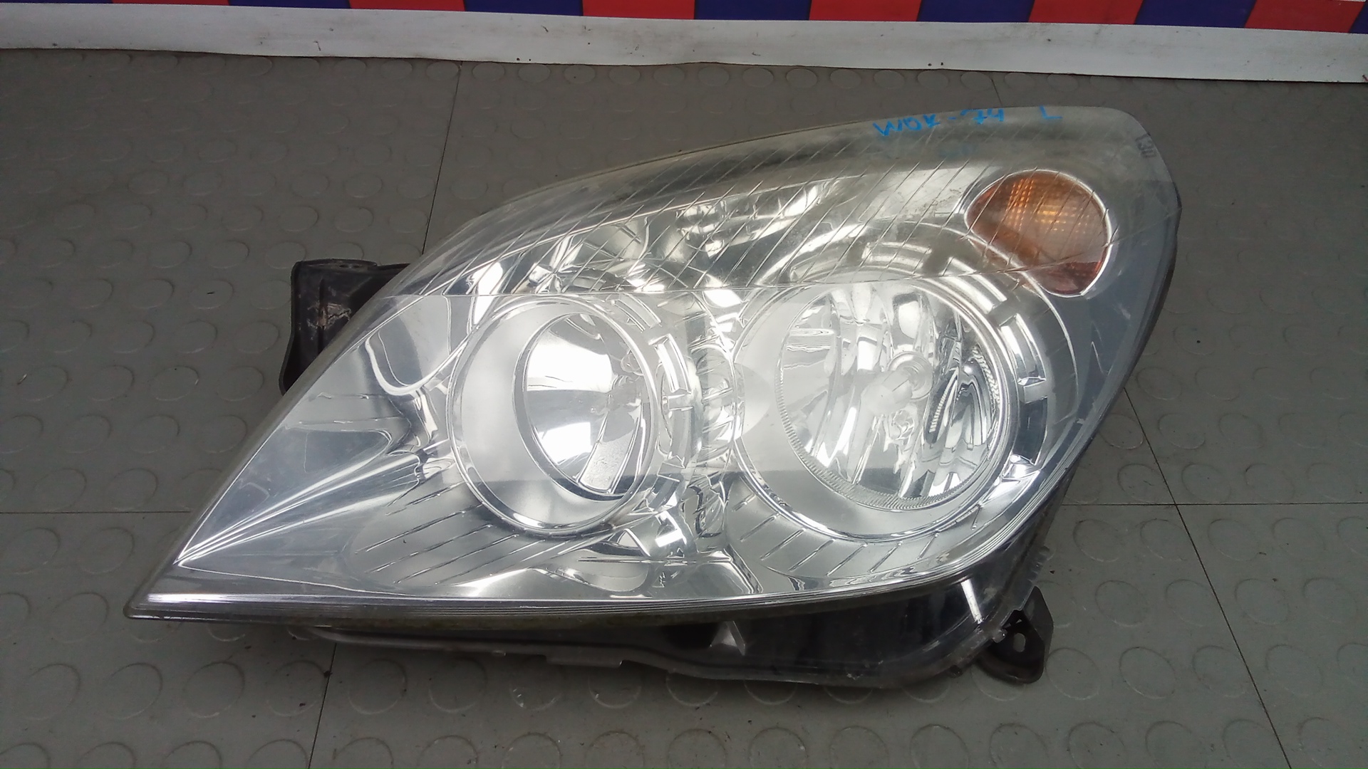 Фара левая Opel Astra H