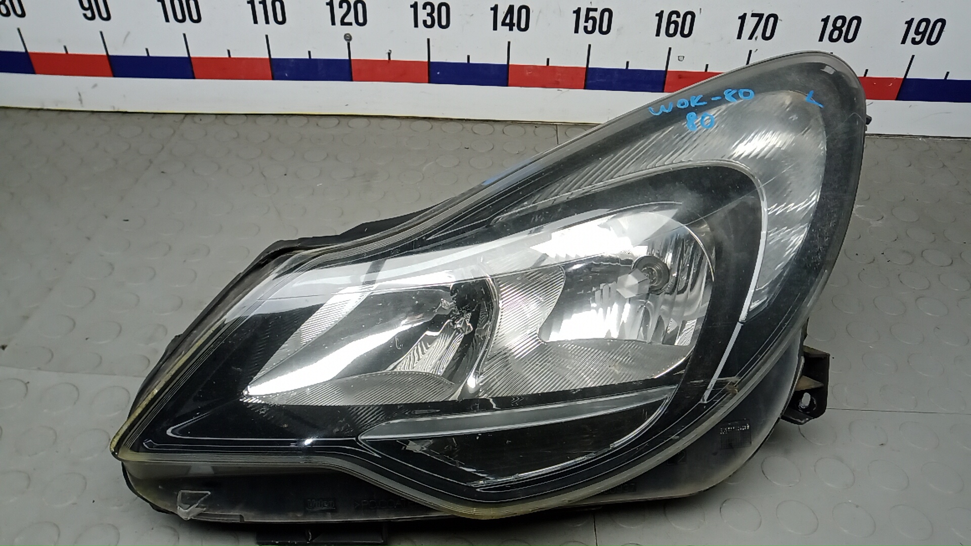 Фара левая Opel Corsa D
