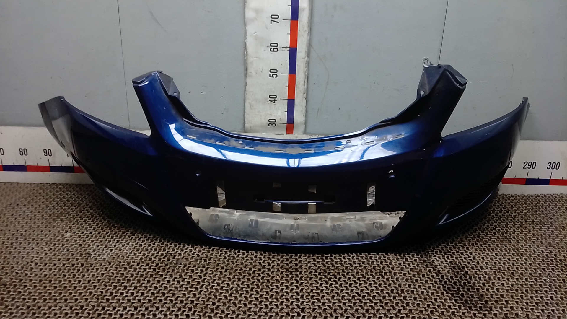Бампер передний Opel Zafira B