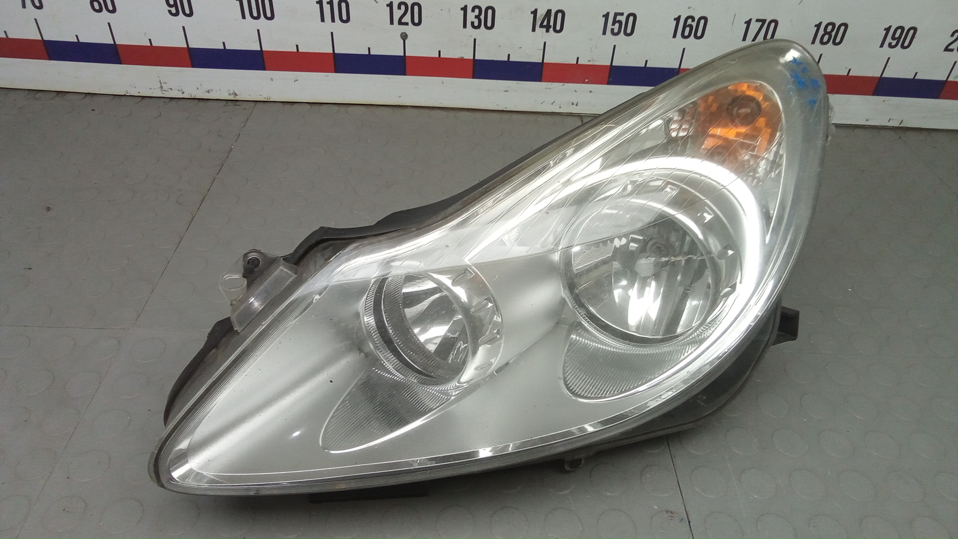Фара левая Opel Corsa D