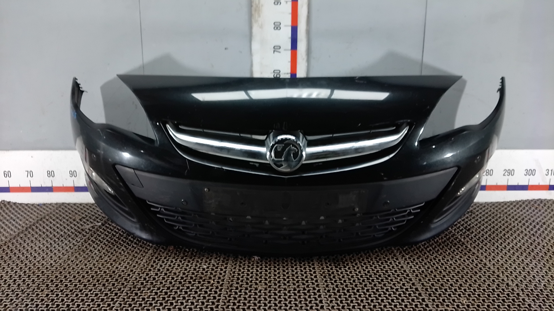 Бампер передний Opel Astra J
