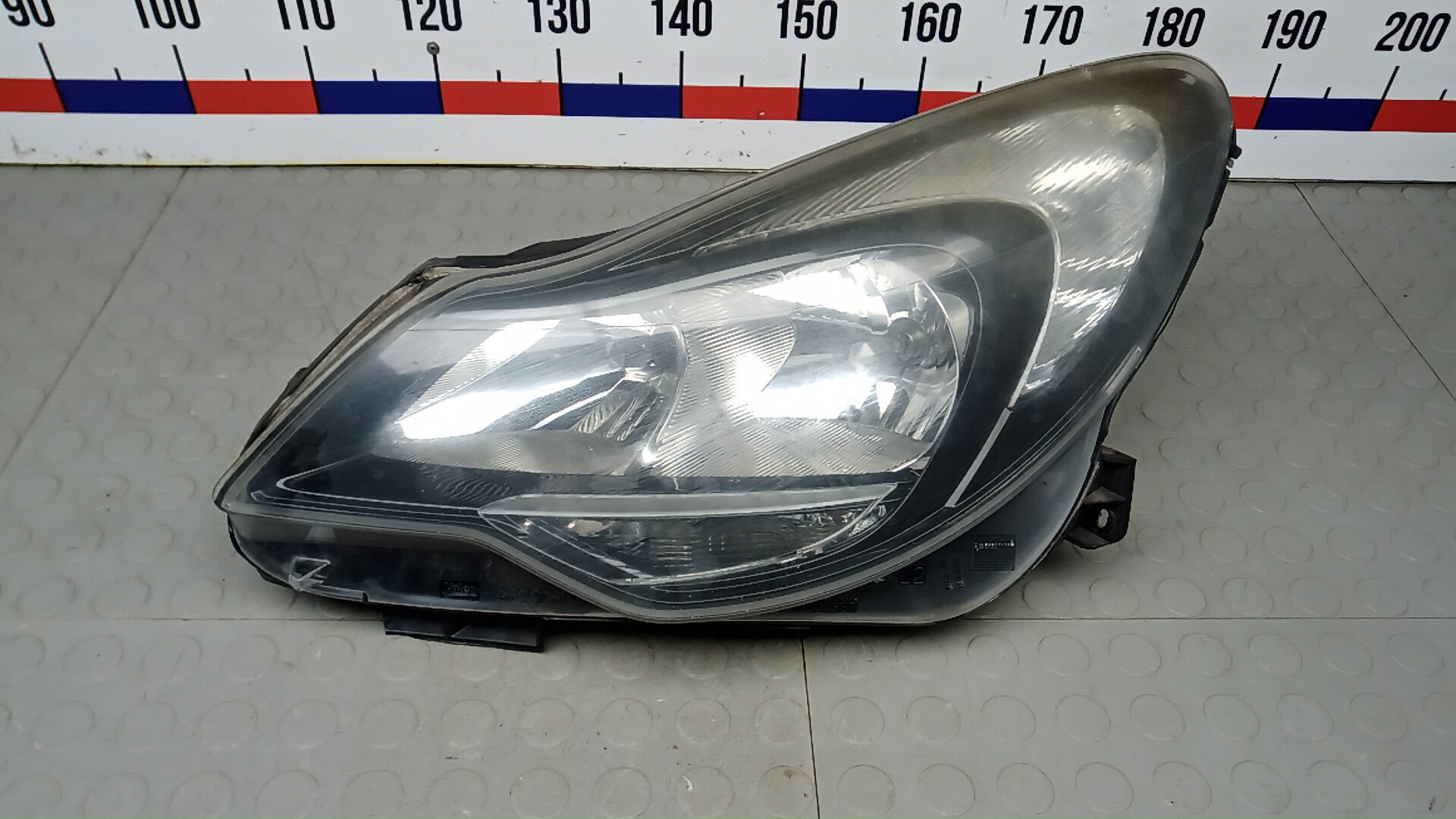 Фара левая Opel Corsa D
