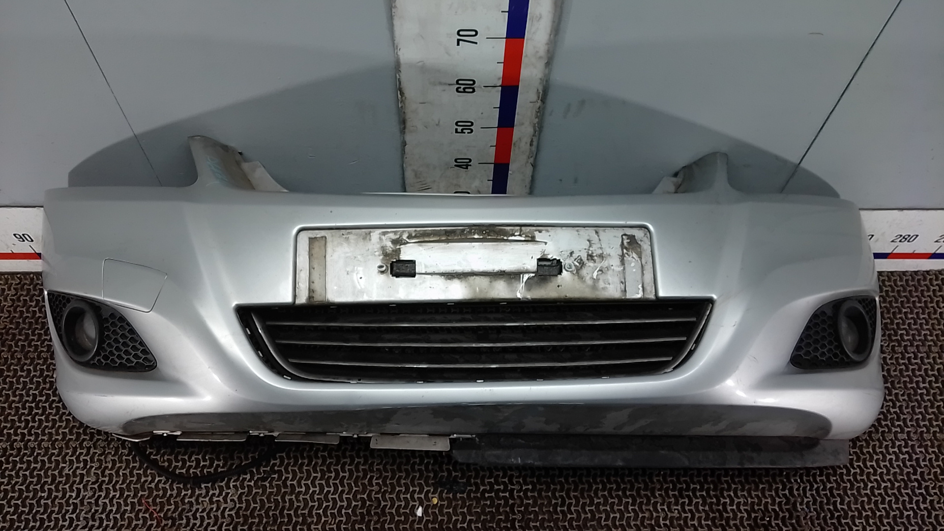 Бампер передний Opel Zafira B